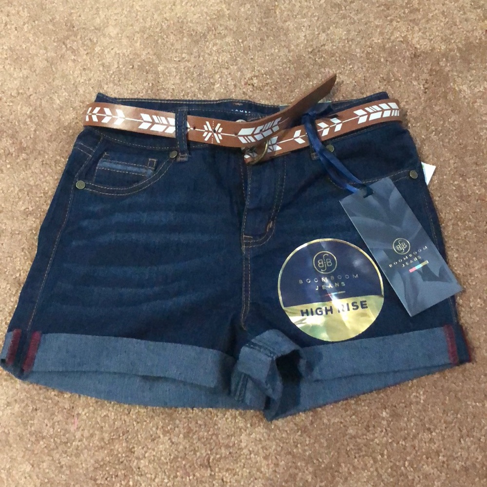 Jean shorts, has a belt. Never worn, has tags.